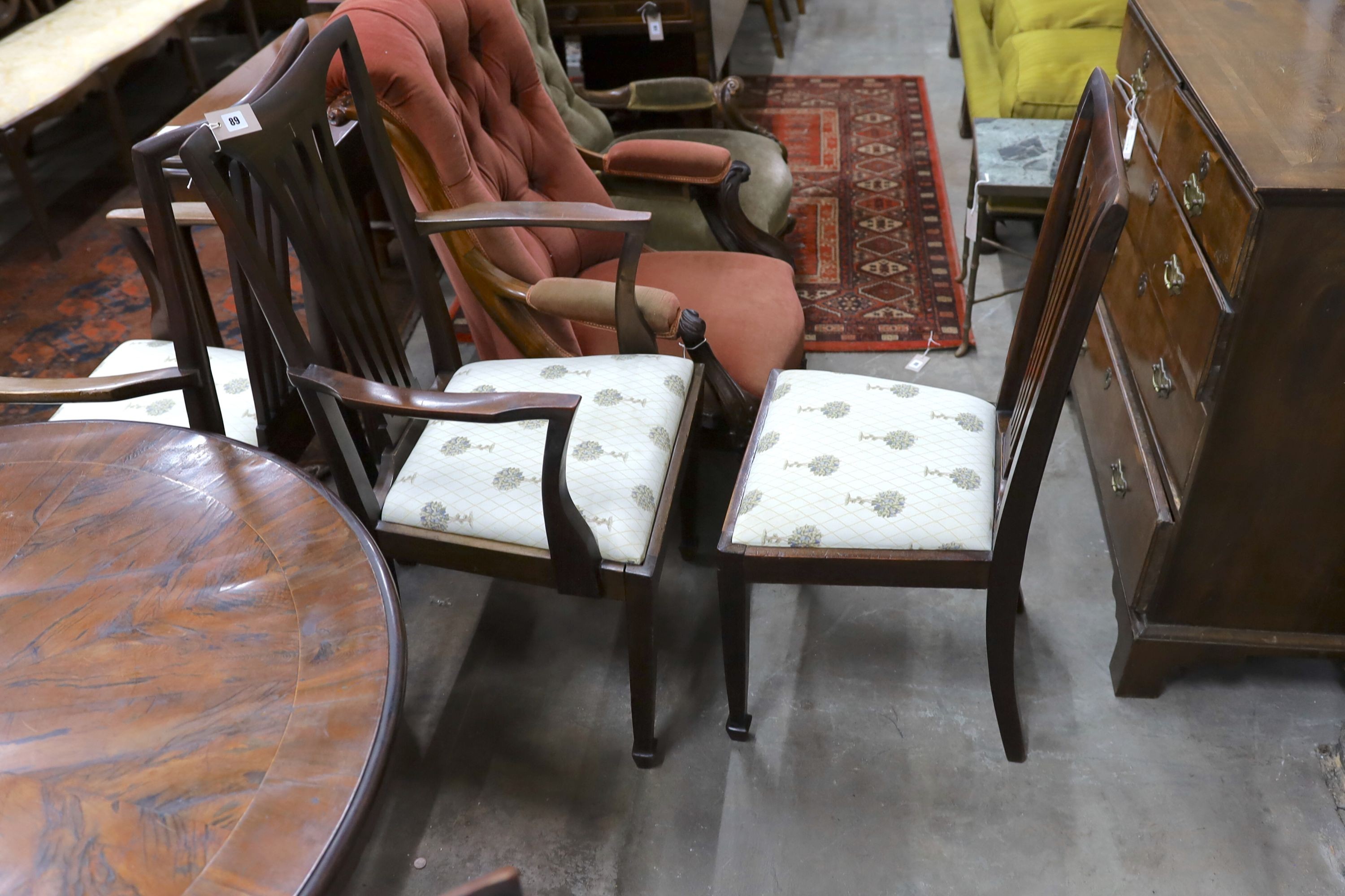 A set of eight early 20th century mahogany dining chairs, two with arms